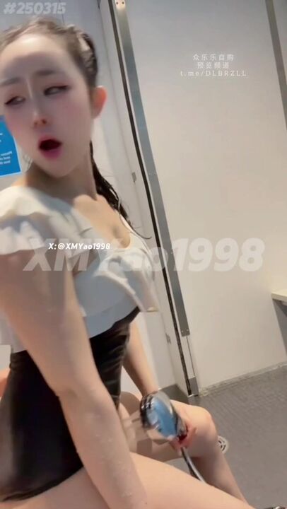 Facial lewd woman with sexy legs in swimming pool changing room 