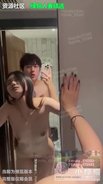 ⁣A muscular, handsome man doggy fucks a pretty long-haired girl in front of the mirror 